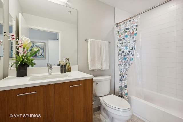 full bathroom with shower / tub combo, vanity, and toilet