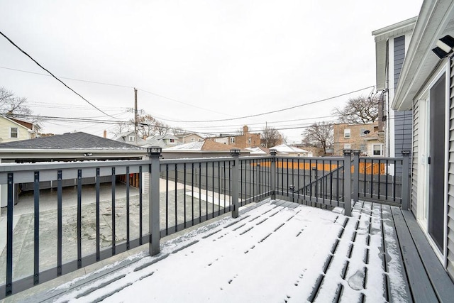 view of snow covered deck