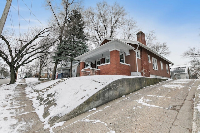 view of snow covered property