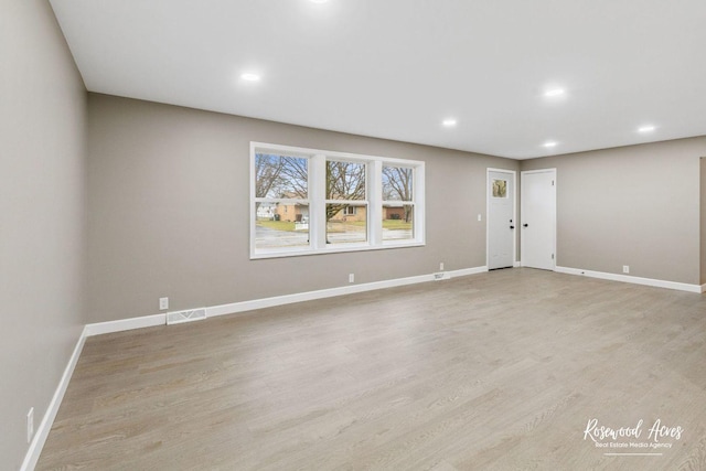 empty room featuring light hardwood / wood-style flooring