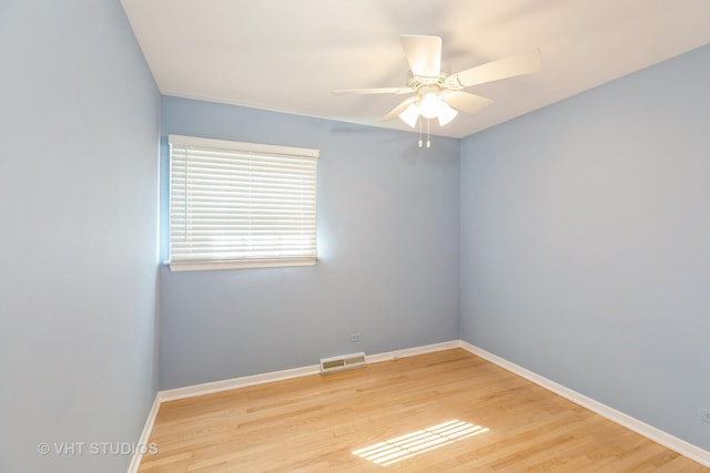 unfurnished room featuring ceiling fan and light hardwood / wood-style flooring