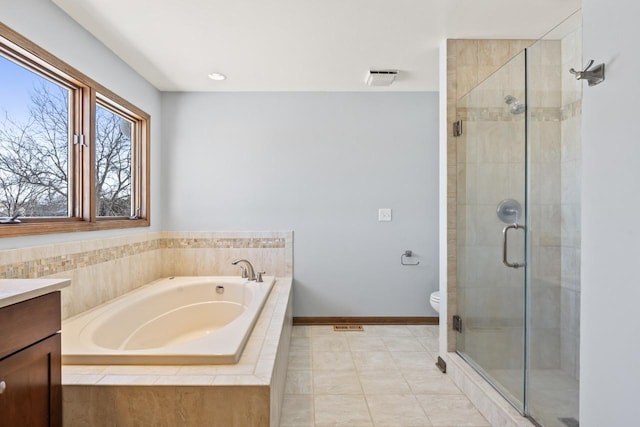 full bathroom featuring vanity, toilet, separate shower and tub, and tile patterned flooring