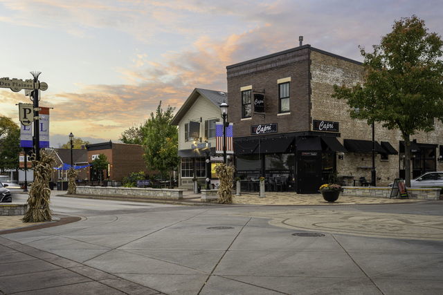 view of outdoor building at dusk