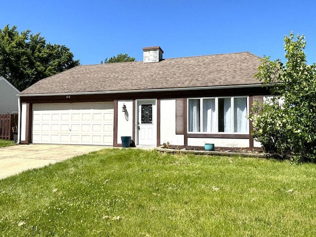 single story home with a garage and a front yard