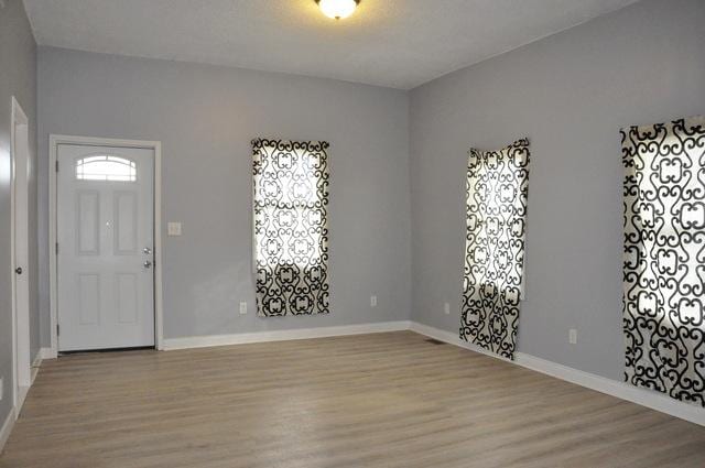 entrance foyer featuring light hardwood / wood-style floors