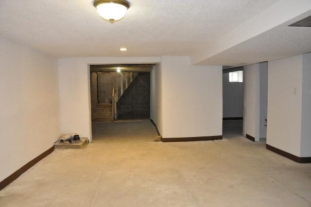 basement with a textured ceiling