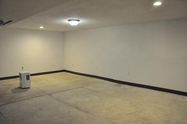 basement with a textured ceiling