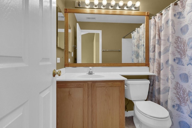 bathroom with a shower with curtain, vanity, and toilet