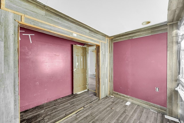 empty room with dark wood-type flooring