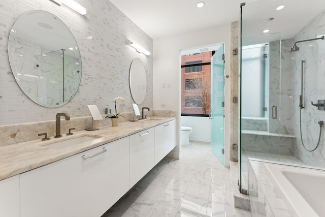 full bathroom with tasteful backsplash, vanity, independent shower and bath, and toilet