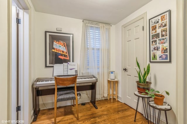 miscellaneous room with hardwood / wood-style floors