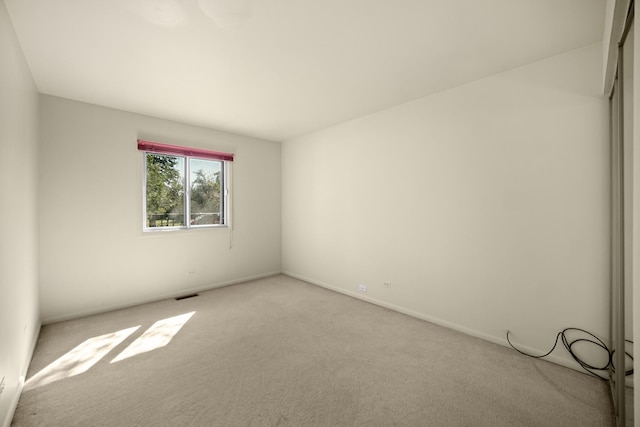 empty room with light carpet