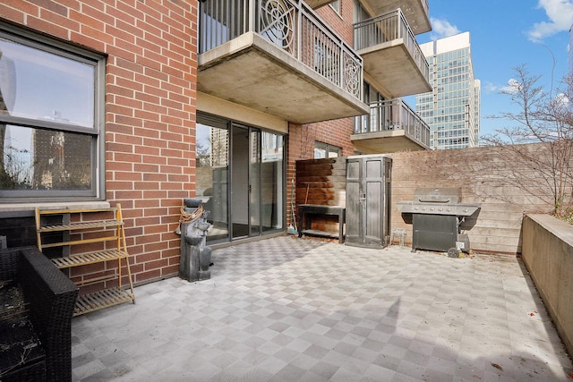 view of patio featuring a grill