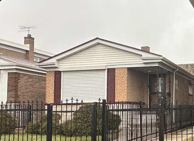 view of side of property featuring a garage