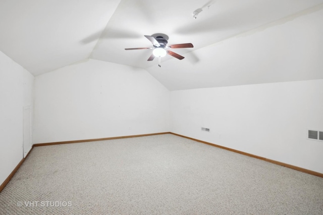 bonus room with ceiling fan, carpet floors, and lofted ceiling