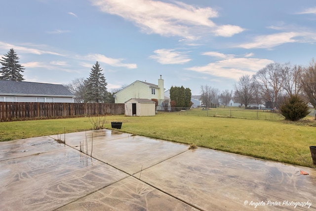 view of patio with a storage shed