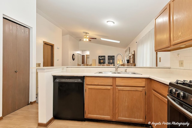 kitchen with ceiling fan, sink, light hardwood / wood-style flooring, dishwasher, and stainless steel range with gas cooktop