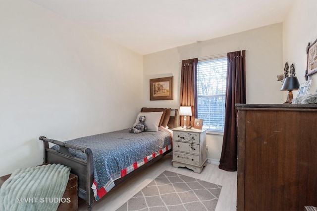 bedroom featuring light hardwood / wood-style flooring