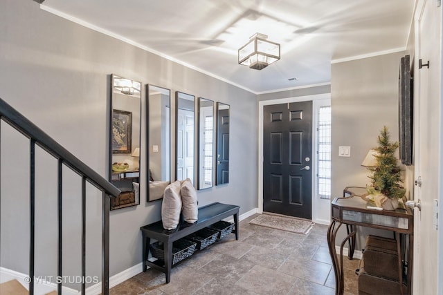 foyer entrance featuring ornamental molding