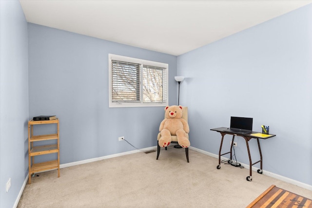 living area with light colored carpet