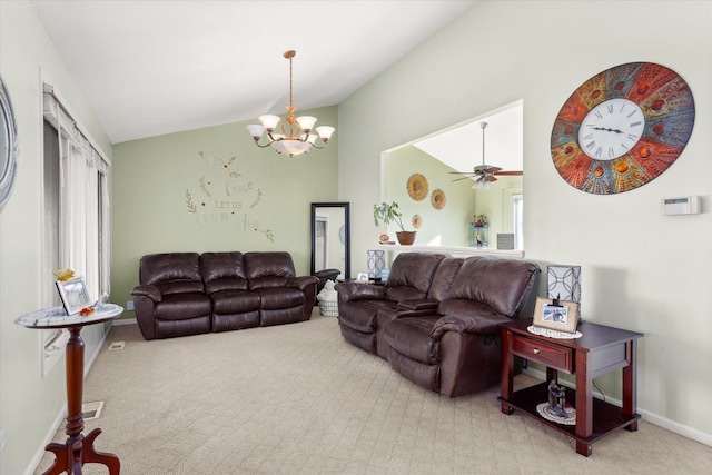 living room with light carpet, ceiling fan with notable chandelier, and lofted ceiling