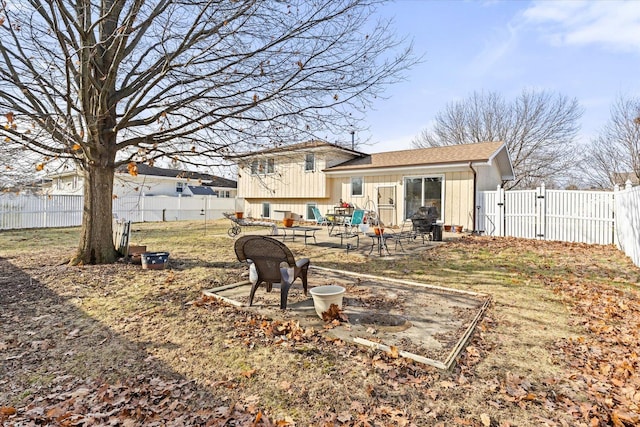 back of property featuring a patio