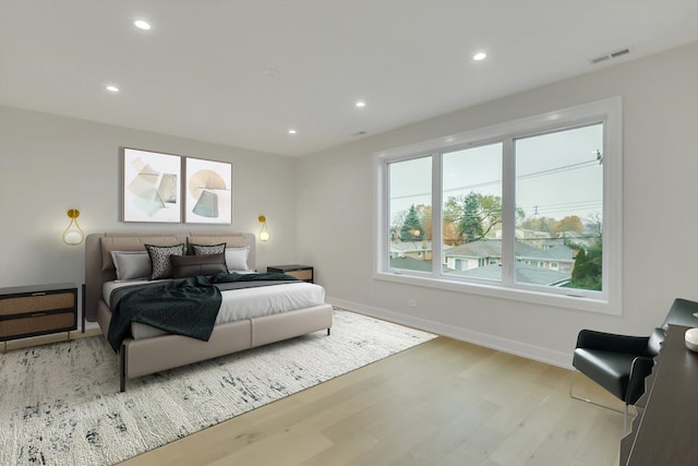 bedroom featuring light wood-type flooring