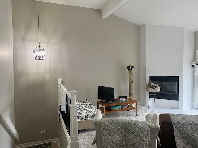 living room featuring lofted ceiling with beams