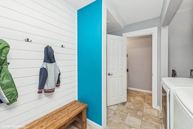 mudroom featuring washing machine and clothes dryer