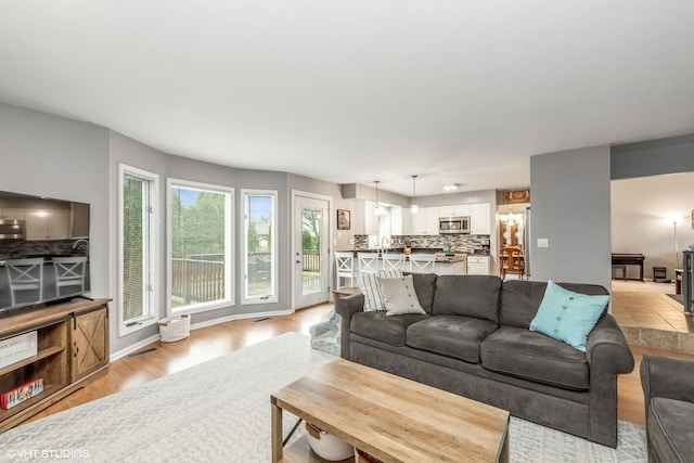 living room with light wood-type flooring