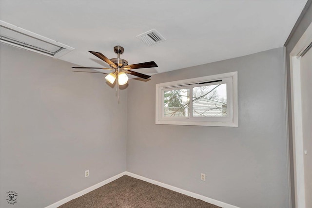 carpeted empty room featuring ceiling fan