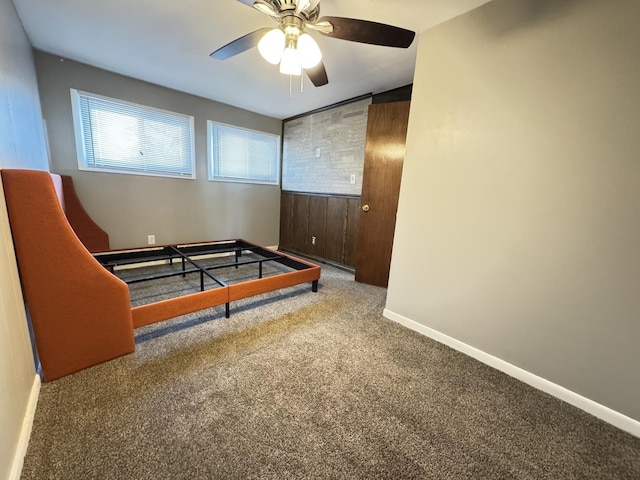 playroom featuring carpet floors and ceiling fan