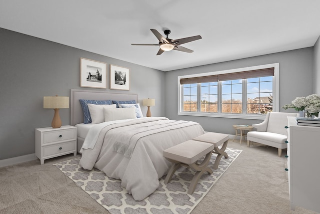 bedroom featuring light carpet and ceiling fan