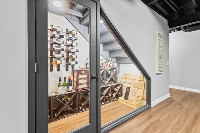 wine room featuring hardwood / wood-style flooring