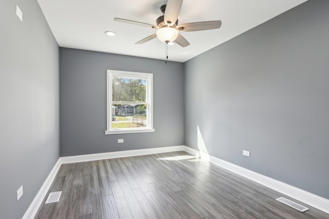 unfurnished room featuring ceiling fan and wood-type flooring