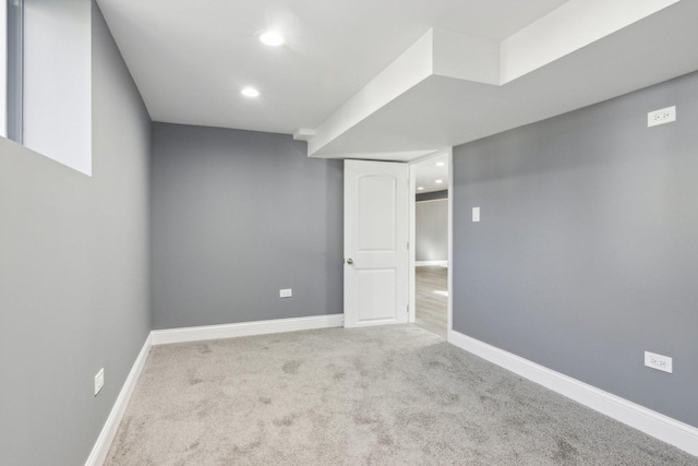 basement with light carpet