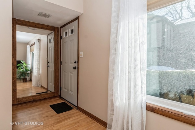 interior space with hardwood / wood-style flooring