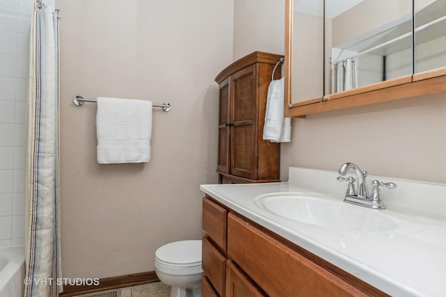 full bathroom featuring toilet, vanity, and shower / tub combo