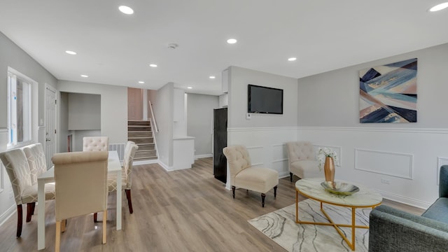 dining area with light wood-type flooring