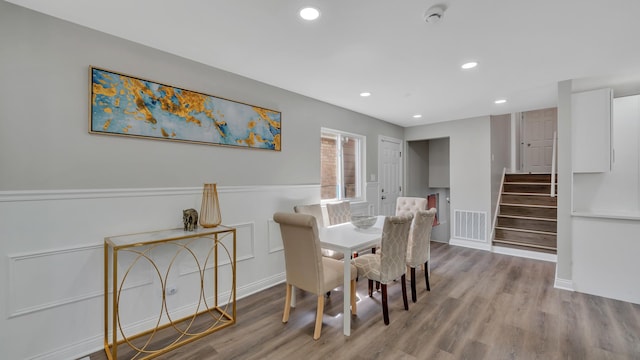 dining space with light wood-type flooring