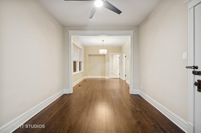 hall with dark hardwood / wood-style floors