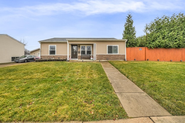 view of front of home featuring a front yard