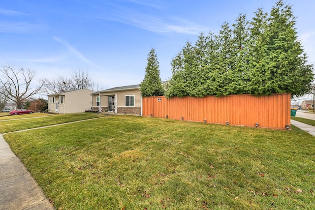 view of front of property with a front lawn