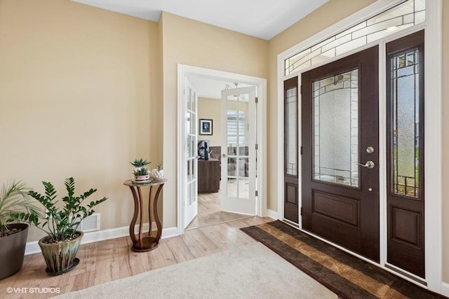 entrance foyer with wood-type flooring