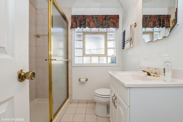 bathroom with vanity, an enclosed shower, tile patterned floors, and toilet