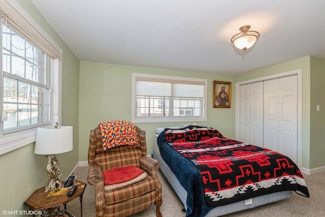 bedroom featuring carpet floors and a closet