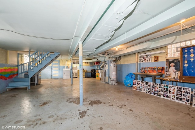 basement featuring washer / dryer and water heater