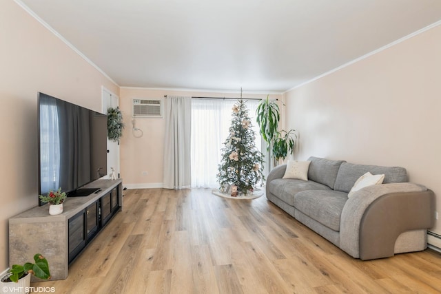 living room featuring a wall mounted AC, crown molding, and light hardwood / wood-style floors