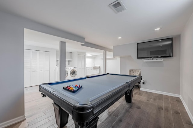 playroom featuring hardwood / wood-style floors, washer and dryer, and pool table