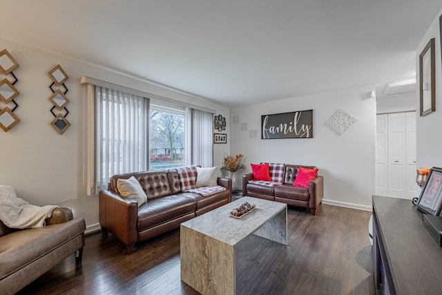 living room with dark hardwood / wood-style floors